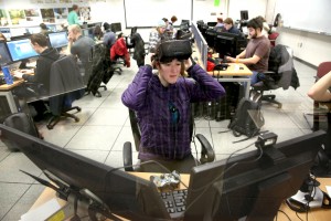 Students use the Oculus Rift in the Game Design and Development computer lab during winter term classes Wednesday, January 14, 2015. Students in the game design and development program will once again travel to L.A. to present their projects to the Jim Henson Company. This time, they are working with the Oculus Rift, a head-mounted virtual reality display.(UW-Stout photo by Brett T. Roseman)