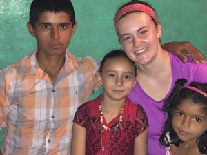 UW-Stout student Allison Roush, second from right, takes a selfie with Las Macias residents, from left, Julio Garcia, Neybeli Jarquin and Anyeli Nathalia.