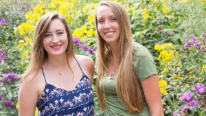 Research done by Conservation and Environmental Science majors Amanda Pastirik, left, and Meghan Wersel shows UWM’s green roofs provide important habitat for bees. (UWM Photo/Troye Fox)