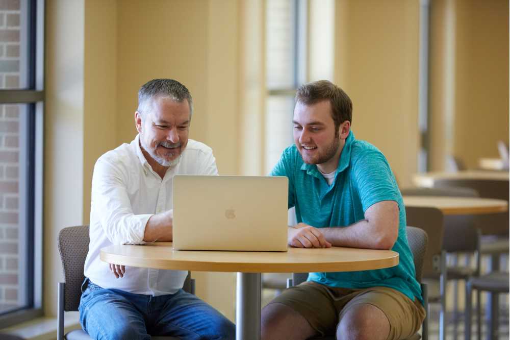 Photo of Engholdt and Mathias, who were paired together through the Eagle Apprentice program, which allows outstanding first-year students to learn side-by-side with UWL faculty.