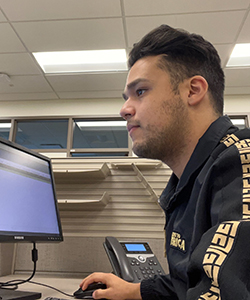 Photo of Alex Valle, a December graduate of the Lubar School of Business, who discovered his first career experience in the purchasing department at Froedtert Hospital. His internship led to a job offer. (Courtesy of Alex Valle)