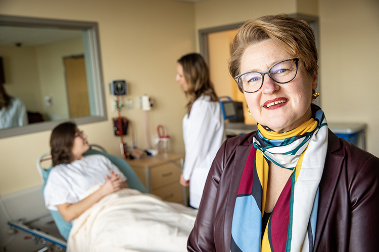 Photo of Melinda Kavanaugh, professor of social work at UWM, who draws on her experience as a medical social worker in hospital neurology units. (UWM Photo/Troye Fox)