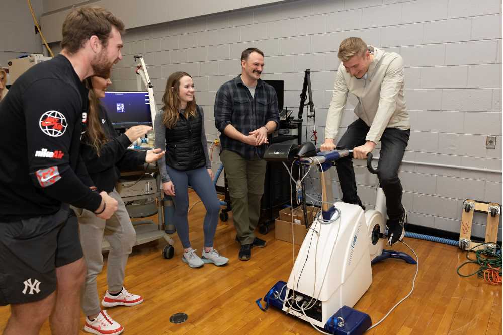 Photo of UW-La Crosse Assistant Professor Ward Dobbs, second from the right, who oversees UWL Exercise and Sport Science Department students working on research through the Seed Grant Program in cooperation with Mayo Clinic Health System. The arrangement has funded six health-focused research projects. The students include, from left, Micah Missall, Adriana Marquardt, Rachel Schmitt and Austin Westra. (UWL photo)