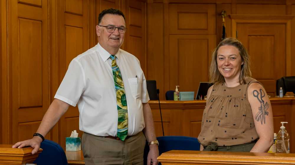 Photo of La Crosse County Circuit Judge Scott Horne and UWL Associate Professor Lisa Kruse. This spring, Kruse's Methods of Social Research I students developed a system for tracking the effectiveness of the county's Drug Treatment Court, which seeks to help those who have committed drug-related offenses successfully reintegrate into society.