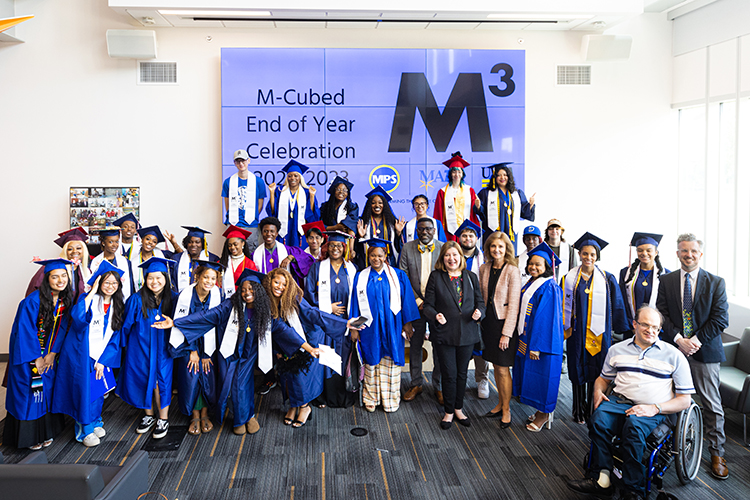Photo of some of this year's graduates of the M-cubed College Connections program who gathered for a photo after the ceremony in June. (UWM Photo/Elora Hennessey)