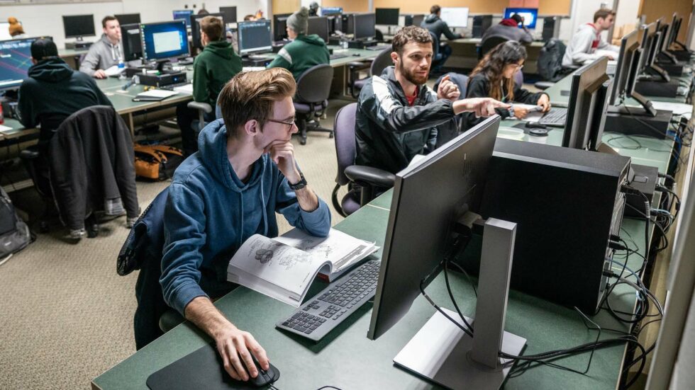 Photo of UWO engineering students. UW Oshkosh will offer a new automation engineering degree to fill a significant manufacturing need in Wisconsin for engineering professionals with programming skills. (UW Oshkosh)