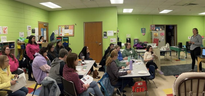 Photo of Brooke Lemke leading a presentation on supporting children's mental health. Lemke, a parent educator/community outreach coordinator with the Sheboygan County Family Resource Center, recently earned a certificate in Pediatric Mental Health through UW-Green Bay's Division of Community Engagement and Workforce Training.