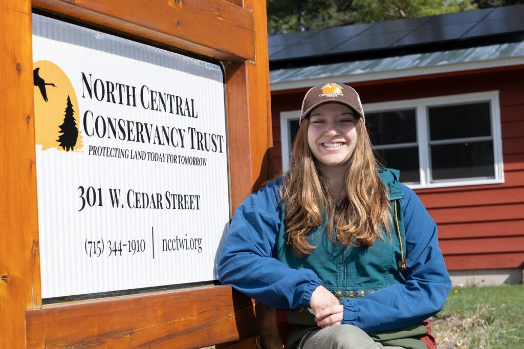 Photo of Morgan Goff, a junior conservation and community planning major at UW-Stevens Point, who is an intern at the North Central Conservancy Trust in Stevens Point.