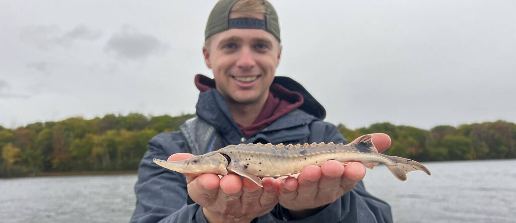 Photo of Zach Nordstrom, part of the Lake Sturgeon conservation research at UW-Green Bay.