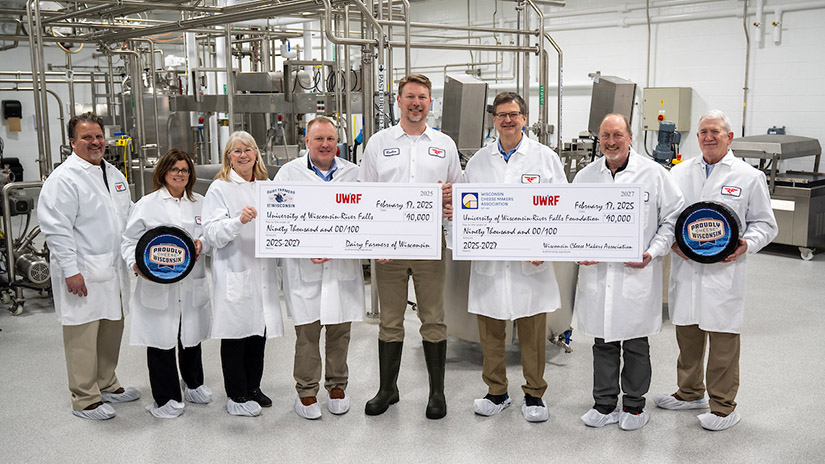Photo of Dairy Farmers of Wisconsin and Wisconsin Cheese Makers Association, who have committed a combined $180,000 to support the UW-River Falls Wuethrich Family/Grassland Dairy Center of Excellence. Pictured from left are Steve Kelm, chair, UWRF Animal and Food Science Department; Lisa Meyer, UWRF dairy plant project coordinator; Kay Zwald, Bomaz Farms operator and DFW board member; Ben Miller, DFW senior vice president of industry relations; Rueben Nilsson, UWRF dairy plant manager; John Umhoefer, WCMA executive director; Mike Orth, dean, UWRF College of Agriculture, Food and Environmental Sciences; and Rick Foy, UWRF assistant chancellor for University Advancement. UWRF photo