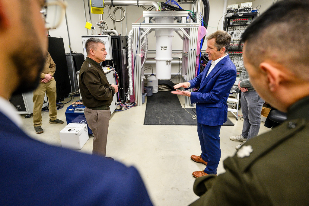Photo: In 2024, campus welcomed a delegation from the United States Cyber Command, which is responsible for the Department of Defense’s cyberspace capabilities. UW–Madison Physics professor Mark Eriksson (right) speaks with Lt. Gen. William J. Hartman, deputy commander of U.S. Cyber Command, during the delegation’s visit to multiple research labs across campus. Photo: Althea Dotzour / UW–Madison