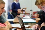 UW-Madison students working on their laptops