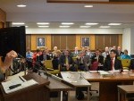 woman addressing a board room