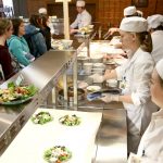 UW-Stout students serve food at a campus café as part of the Quantity Food Production class. The university’s School of Hospitality Leadership has been ranked No. 10 in the world by CEOWorld magazine.