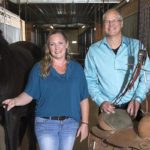 UW-River Falls student innovator Shanna Burris helps paraplegic horseback riders