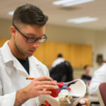 Photo of a UW-Platteville student working in a health lab