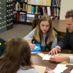 Photo of researchers conducting archival research in the Southwest Wisconsin Room.