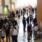 Photo of UW-Madison undergraduate students showcasing their biomedical engineering research projects in December 2018.