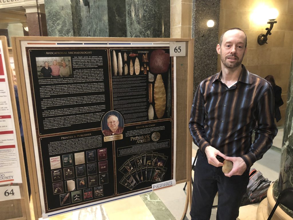 Photo of UW-Platteville Richland nontraditional student Chris Hynek presenting his research at Research in the Rotunda; Hynek is documenting his father’s life, which was dedicated to preserving prehistoric Native American culture.