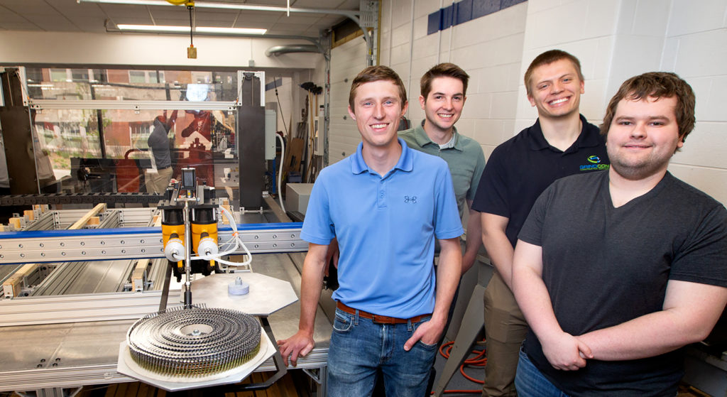 Photo of UW-Stout engineering students who are using their knowledge to benefit workers in Wisconsin