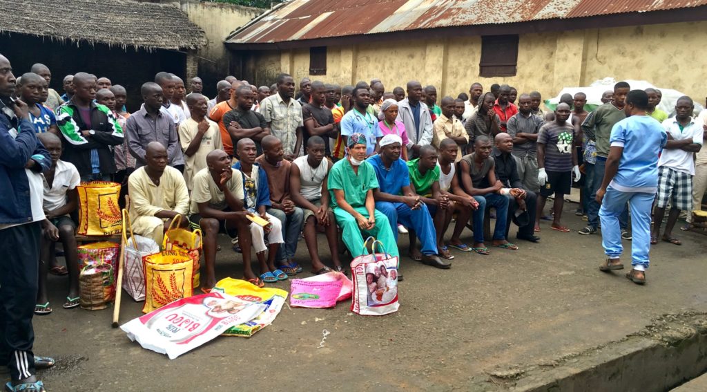 Photo of UW-Oshkosh alumnus Patrick Gaughan, Class of ’71, in Central Africa working with Smile Train in his second career as a registered nurse.