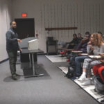 Photo of UW-Parkside alumnus Martel Pipkins returning to his alma mater to teach as a visiting sociology professor