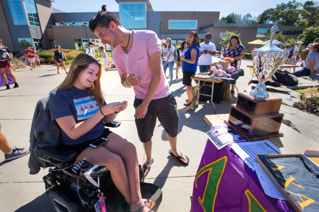 Photo of a UW-Whitewater student fair offering services to students with disabilities