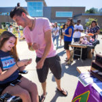 Photo of a UW-Whitewater student fair offering services to students with disabilities