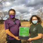 Photo of national award recognizing UW-Whitewater's sustainability efforts