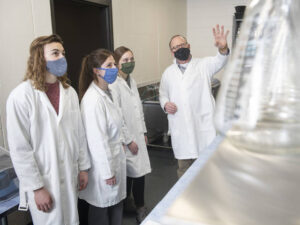 Photo of a faculty-student research team, which has found the brain is more sensitive to alcohol in older people. The researchers include (from left) Dr. Doug Matthews and students Bailey Imhoff, Sam Scaletty and Quinn Petersilka.