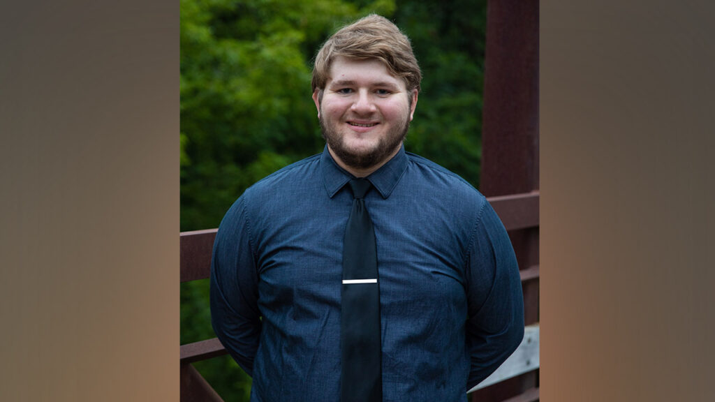 Photo of Hayden Pierce, a senior political science and criminal justice major who has worked on the project as a research assistant since last fall.