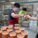 Photo of dietetics students making soup that will be shared with the community through Farmshed's Buy a Quart, Donate a Meal program.