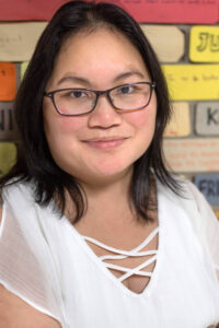 Photo of Pang Yang, a multilingual teacher with more than 20 years of K-12 classroom experience teaching of English language learners and Hmong heritage language learners. She teaches in Osseo Area Schools in Minnesota. (Photo from the Hmong Language Resource Hub)