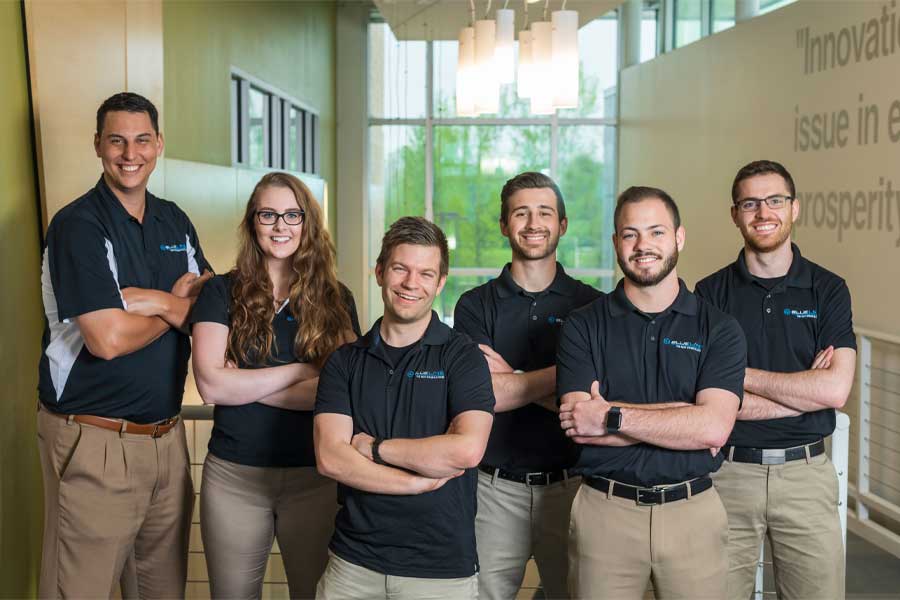 Photo of Blue Line team members, from left: Chief Operations Officer John Lapota, Marketing Director Kristen Holtan, CEO and Lead Engineer Dustin Herte, Chief Sales Officer Lukas Walter, Lead Sales Manager Tyson Curtis, and Business Development Director Benjamin Brietenbucher. (Photo from https://bluelinebattery.com/about)