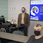 Photo of undergraduate and graduate students in UW-Eau Claire’s communication sciences and disorders programs who assisted Blugold Brain Injury Group members in developing a presentation for Mayo Clinic Health System providers. In the presentation, BBIG members told providers what it’s like to live with a traumatic brain injury. Blugolds helping with the project include (seated from left) Bailey Harder and Crystal Zehm, and (standing from left) Dr. Jerry Hoepner and Hannah Yingst.