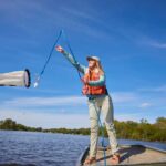 Photo of UW-La Crosse grad student Courtney Baker investigating microplastics in the Mississippi River in this 2019 photo. Through the Freshwater Collaborative, UWL students and faculty will continue to be global leaders in freshwater science and critical aquatic issues.