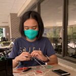 Photo of early fall 2020, when College of Engineering student employees assembled Badger Seal mask fitters outside the Grainger Engineering Design Innovation Laboratory in Wendt Commons. RENEE MEILLER, UW–MADISON COLLEGE OF ENGINEERING