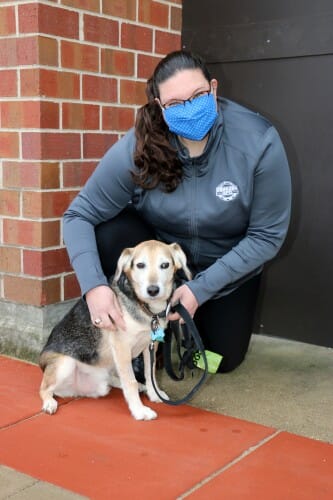 Photo of Brittney Maehl and Chester outside of UW Veterinary Care. PHOTO COURTESY OF UW SCHOOL OF VETERINARY MEDICINE