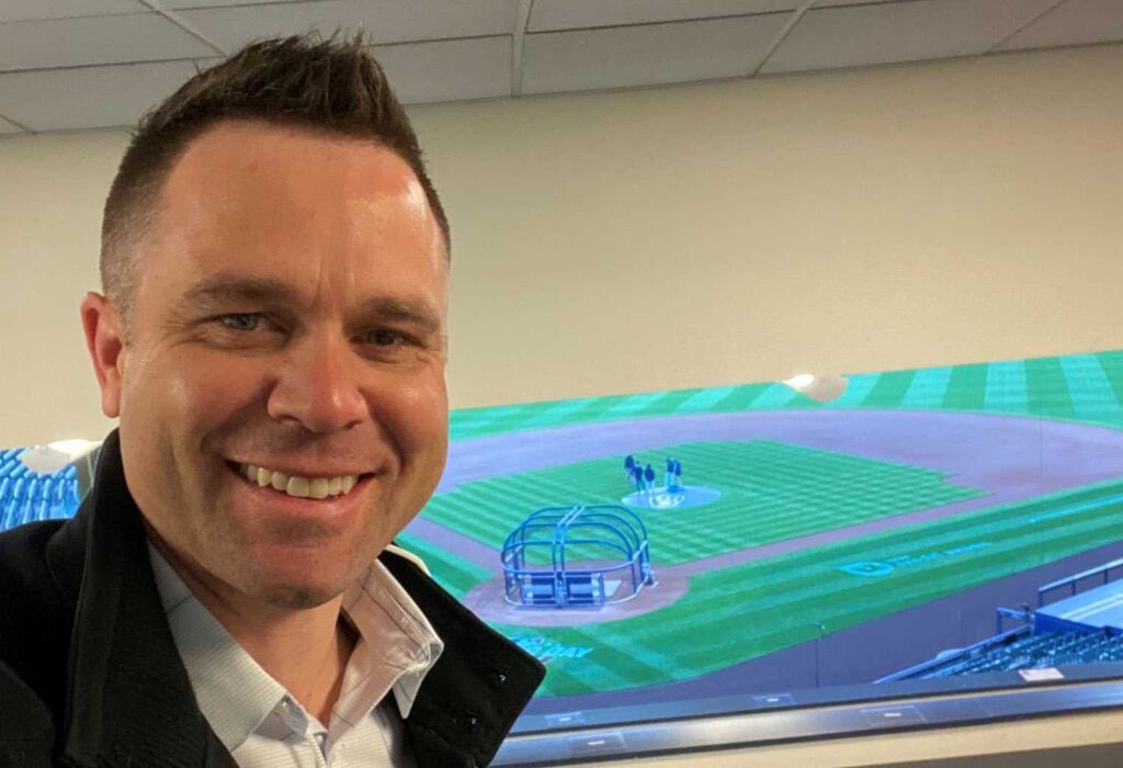 Photo of former UWL Eagle Vinny Rottino, ’02, who has joined the broadcast team of “Brewers Live,” providing pre- and post-game analysis on Bally Sports Wisconsin. “There have been a number of challenges,” Rottino says, “but I’d say the biggest one has been learning to talk about baseball without getting too far into the weeds.”
