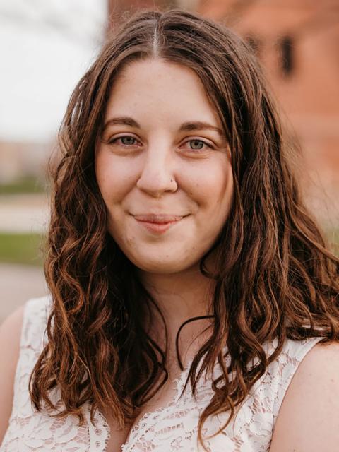 Photo of Abi Gardiner, who earned three bachelor’s degrees from UW-Stout in four years. / Photo by Abigail Ann Photography