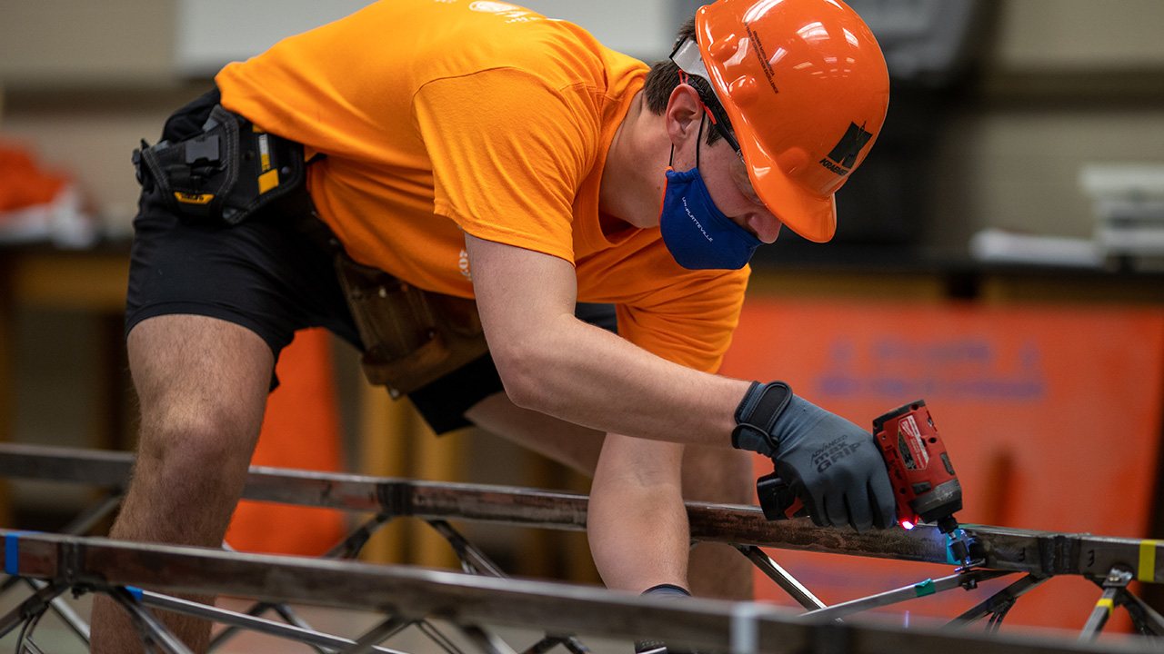 Photo of UW-Platteville student participating in national steel bridge competition