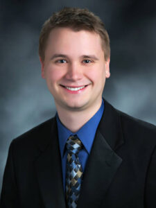 Photo of Dr. Greg Fischer, associate human molecular geneticist at PreventionGenetics, specializing in autism disorders