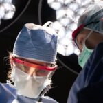 Photo of doctors in surgical room