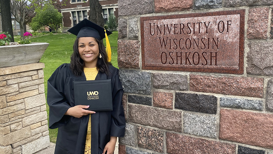 Photo of Green Bay native Faythe Brennan, who started out at the University of Wisconsin Oshkosh planning to study biology, but graduated in spring 2021 with a bachelor’s degree in sociology.