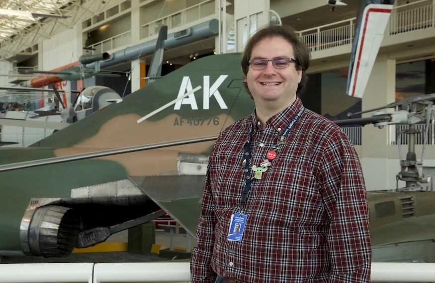 Photo of Sean Mobley, '12, a social media and content specialist for the Museum of Flight in Seattle. As a student at UW-La Crosse, Mobley recorded podcasts in his residence hall using a Guitar Hero microphone — experience that has come in handy throughout his career.