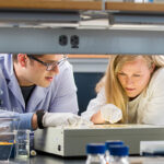 Photo of UW-Milwaukee alumna Sarah Parker working in a lab at Smidt Heart Institute at Cedars Sinai in Los Angeles. (Photo courtesy of Cedars Sinai)