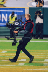 Photo of Kenton Barber in action at a Green Bay Packers game.