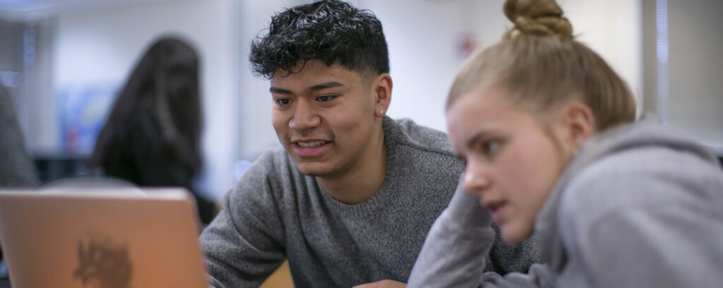 Photo of students in computer lab. UW-Whitewater extends leadership in cybersecurity with new degree.