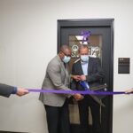 Photo of ​Joshua Hagen, dean of the College of Letters and Science; Chancellor Thomas Gibson; Ray Ackerlund, president of Skyward; and Cindy McCabe, head of the Department of Mathematical Sciences, helping to open the new Skyward Internship Center at UW-Stevens Point.