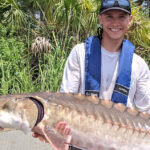 Photo of Austin Draper, whose love of fish led him to a career in water sciences.